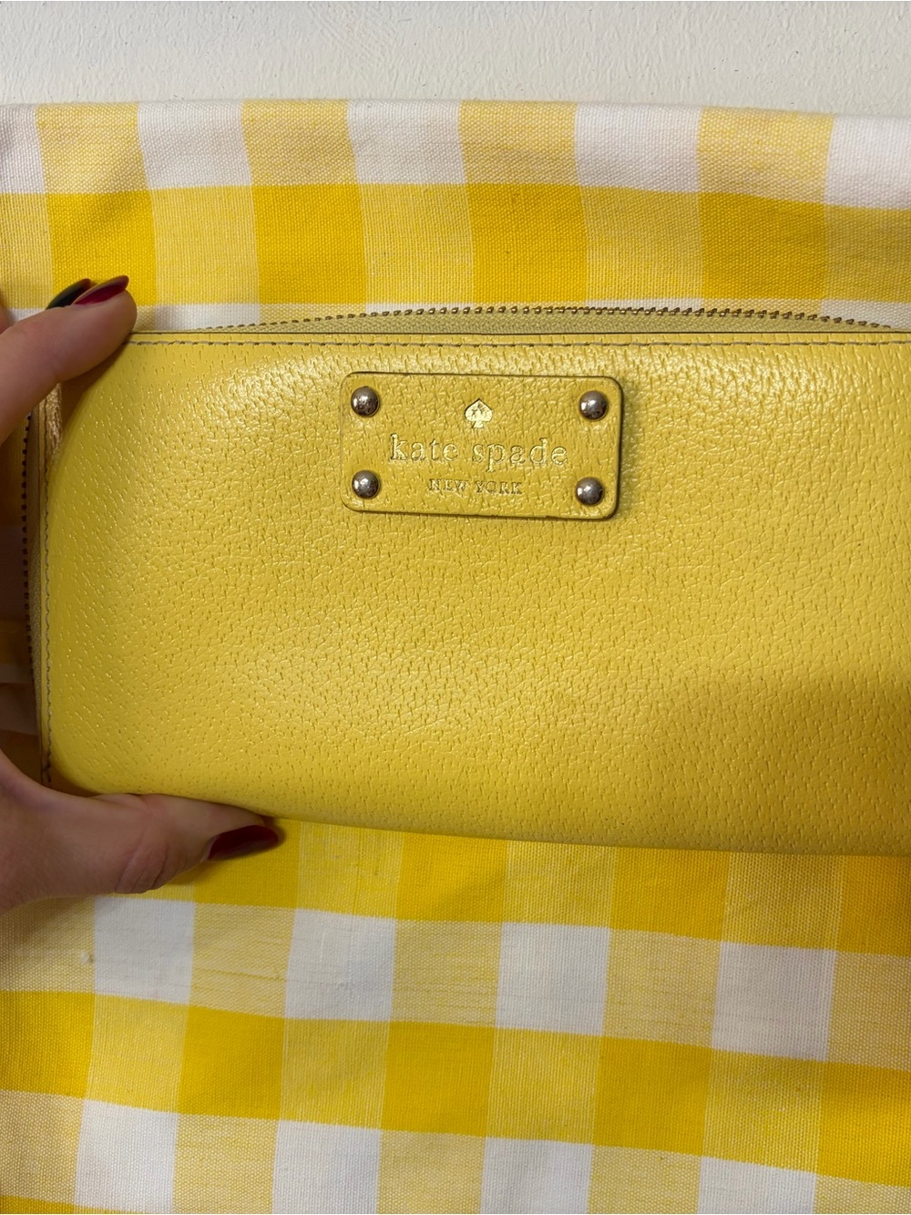 kate spade yellow pebbled leather zip-around wallet with gold plate